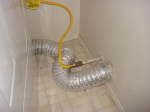 Connector hose between dryer and wall