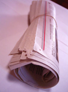 Rolled up newspaper used in priming the flue